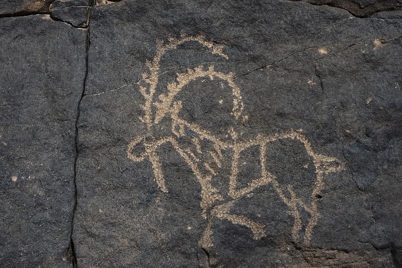 Rock inscription and figures in the Hima Cultural Area