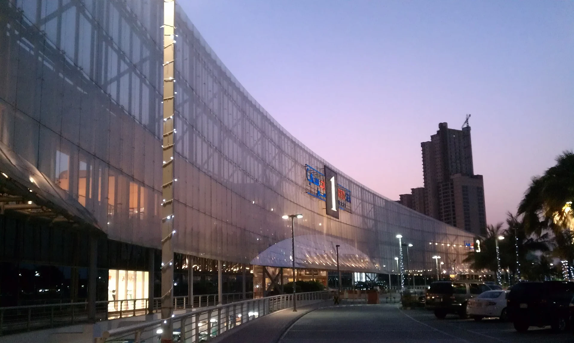 Red Sea Mall main entrance at dusk